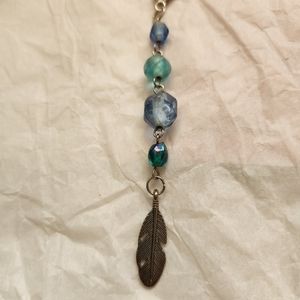 Feather purse pull charm